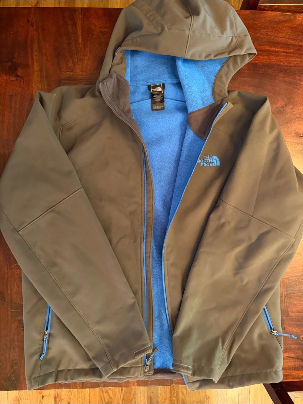 The North Face Men’s Brown Softshell Jacket with Blue Fleece Lining and Hood